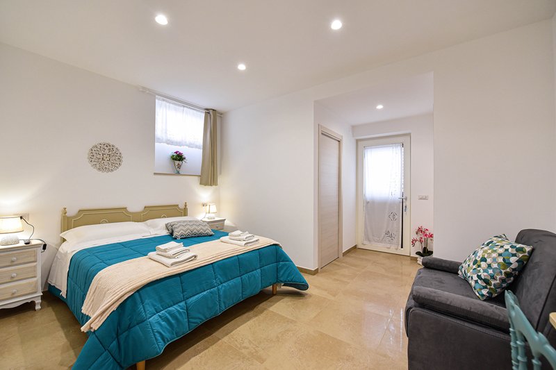 Modern and bright bedroom with independent entrance
