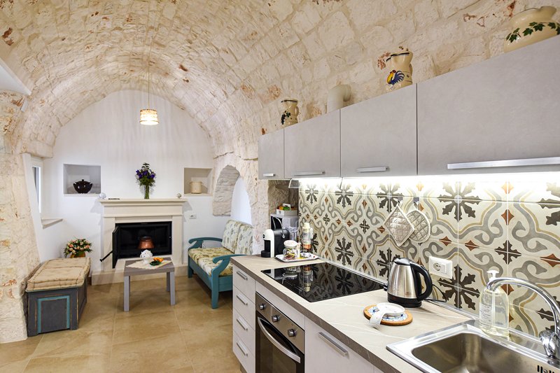 Bright open space kitchen in renovated historic environment
